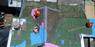 Diam-diam Instruksi Anies Cat Warna-warni Genteng Rumah Dilaksanakan Pengecatan genteng rumah | Foto : Istimewa