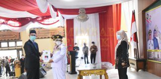 Sah! Dawam dan Azwar Hadi Pimpin Lampung Timur Serah Terima Jabatan dan Laporan Pelaksana Tugas Plh Bupati Lampung Timur.