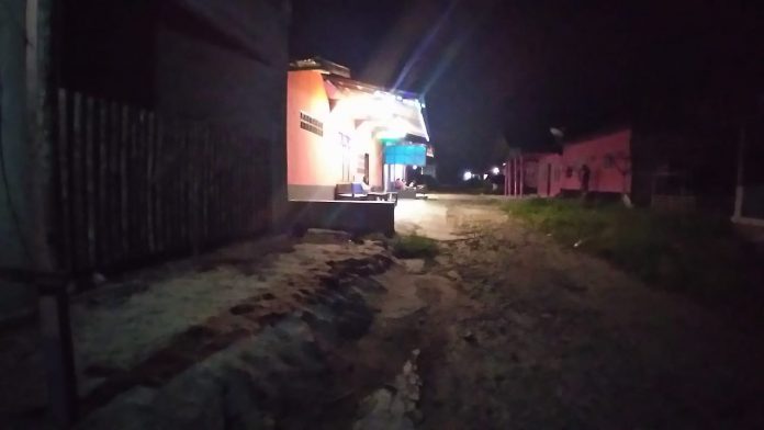 Suasana malam di Lokalisasi Pal 12 dan Jalan Lingkar Luar Palangkaraya.