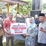 Bupati Bengkalis Serahkan Perangkat MOLDUK Portable Kepada UPT Disdukcapil