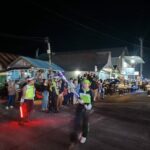 Polres Lingga Kawal Tradisi Taptu dan Pawai Obor Sambut HUT ke-80 Kemerdekaan RI