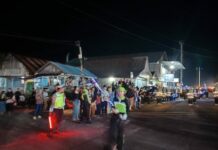 Polres Lingga Kawal Tradisi Taptu dan Pawai Obor Sambut HUT ke-80 Kemerdekaan RI